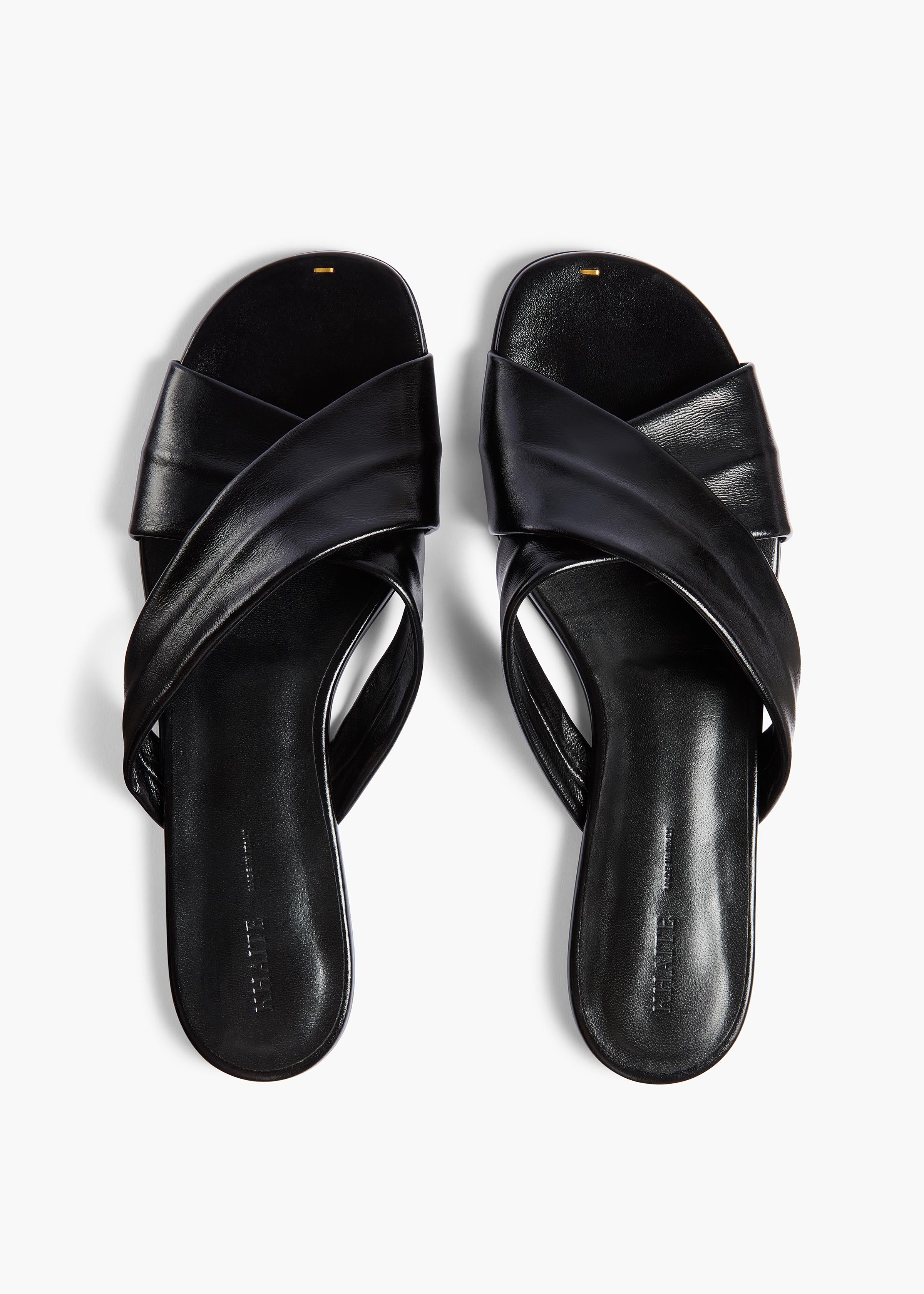 Khaite - Liria Flat Sandal in Black Glazed Leather - Image 10